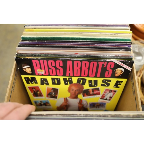 284 - 2 boxes of good condition records, incl The Hollies, Linda Ronstadt, etc