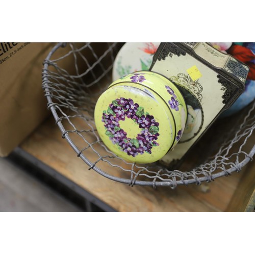 291 - Vintage tins in wire basket