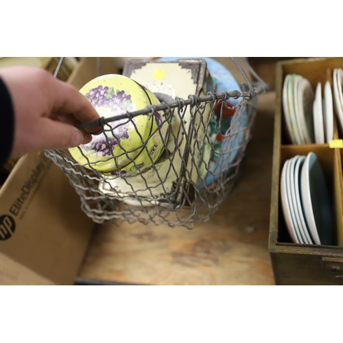 291 - Vintage tins in wire basket