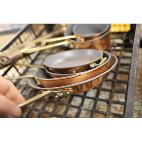 294 - Tray with copper pans, decorative musket