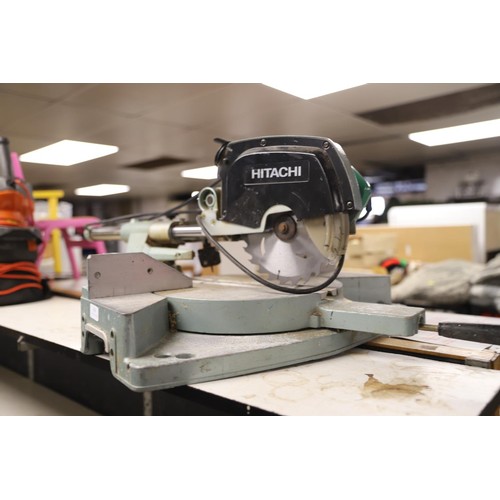 318 - Hitachi chop saw - warranted until 12 noon Tuesday following the above sale