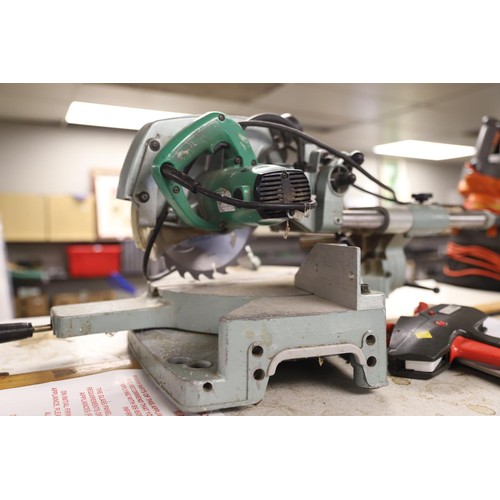 318 - Hitachi chop saw - warranted until 12 noon Tuesday following the above sale