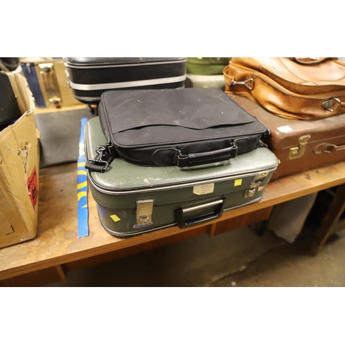 335 - 7 vintage suitcases & 1 laptop bag