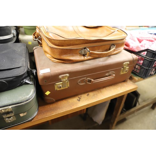 335 - 7 vintage suitcases & 1 laptop bag