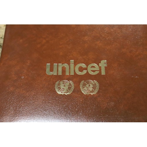 402 - stamps - unicef collectors album and GB first day covers