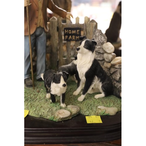 446 - Leonardo collection figurine shepherd with border collies & pups