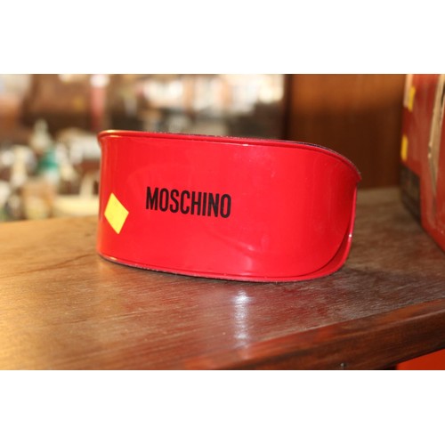 484 - Pair of Moschino sunglasses in red case