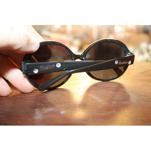 484 - Pair of Moschino sunglasses in red case