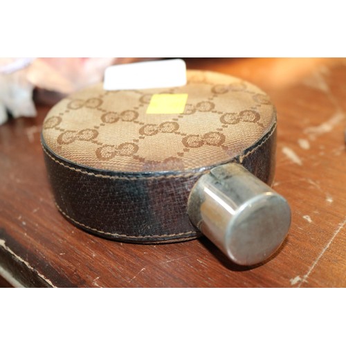 489 - 1970's Gucci leather patterned hip flask