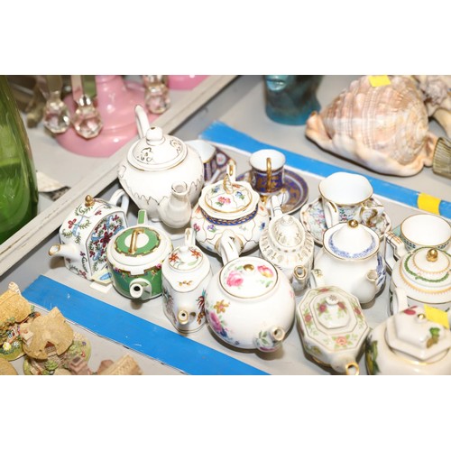 547 - Collection of miniature tea pots, cups & saucers