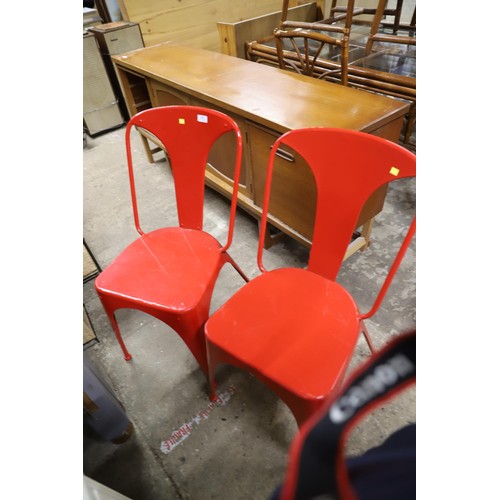 600 - Pair of red metal chairs