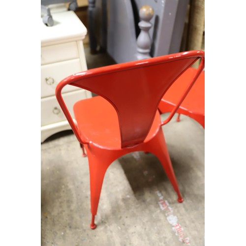 600 - Pair of red metal chairs