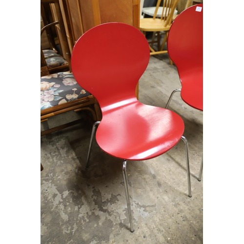 601 - 2 red kneeler style chairs