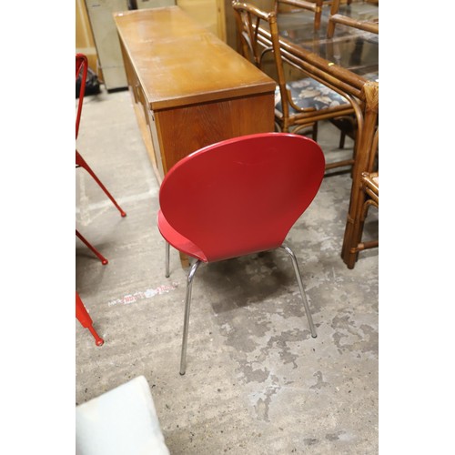 601 - 2 red kneeler style chairs