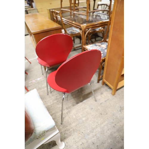 601 - 2 red kneeler style chairs