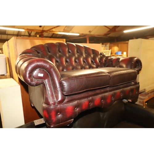 647 - 2 seater red leather chesterfield style sofa