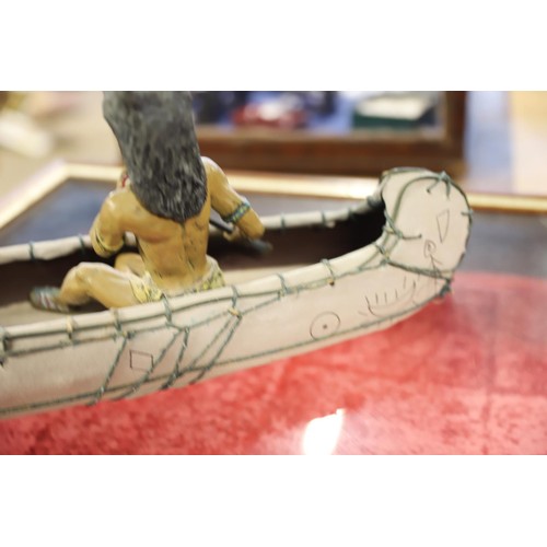 388A - American native and dog in canoe