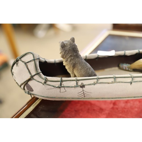 388A - American native and dog in canoe