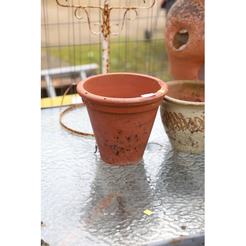 31 - Garden glass top table, metal pot stand, terracotta strawberry pot & others