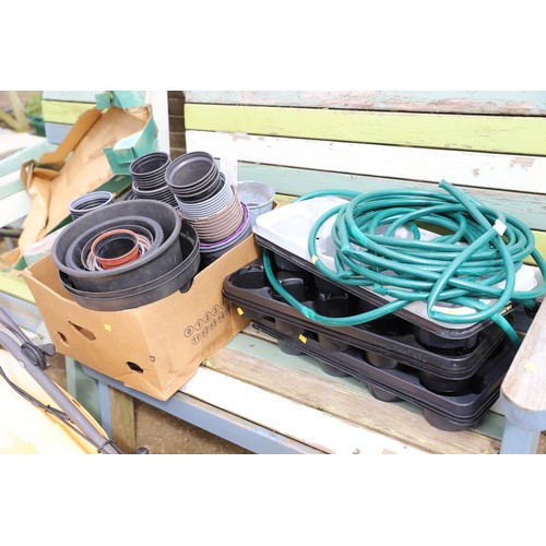 67 - Plastic flower pots & hose