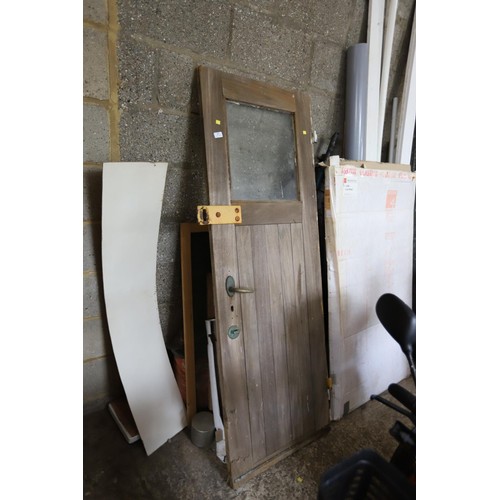 87 - solid oak ships door with brass fittings