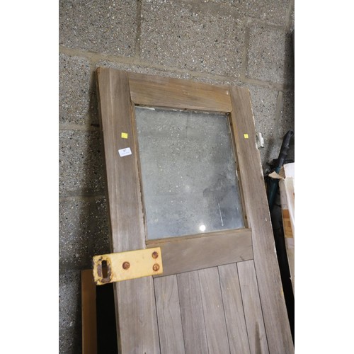 87 - solid oak ships door with brass fittings