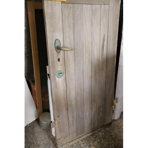 87 - solid oak ships door with brass fittings