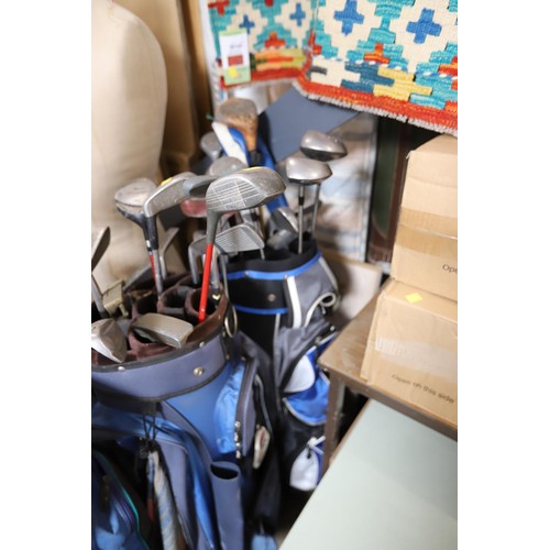 143 - 3 golf bags & various clubs