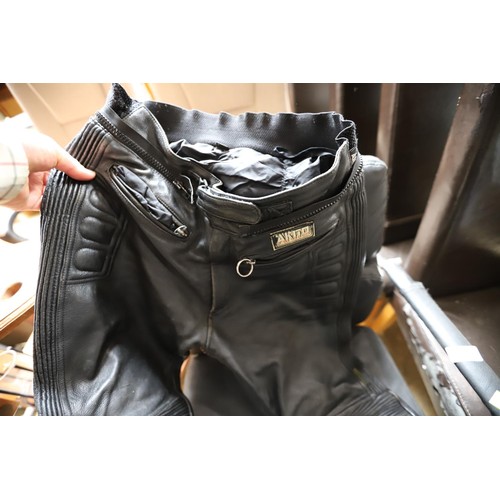 201 - 2 x motorcycle jackets & 1 x trousers