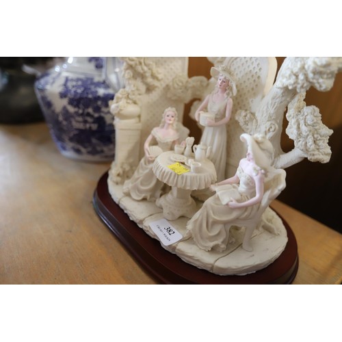 382 - Three lady coral figurine