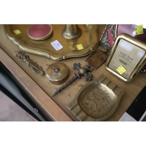 452 - Brass tray with frame, corkscrew, bells, etc