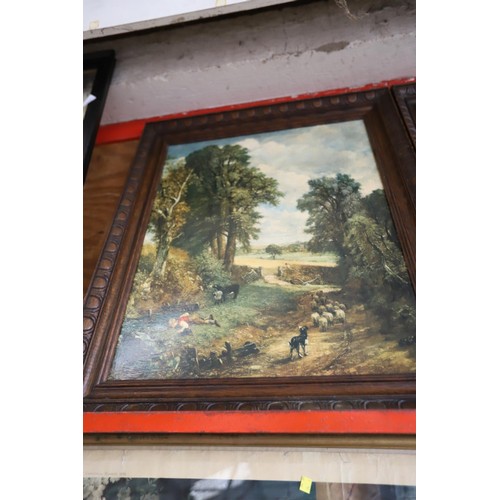 512 - Pair of vintage constable prints (varnished on board) in carved oak frames