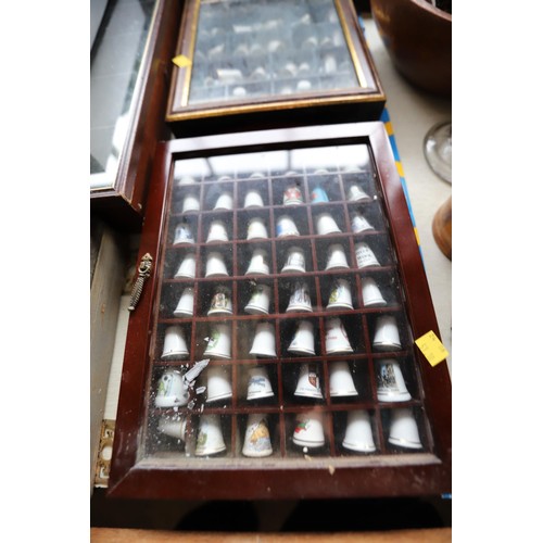 541 - Collection of thimbles & display case