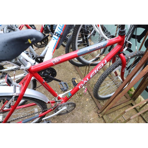 18 - Raleigh red bike