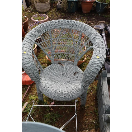 60 - Garden table with wicker armchair