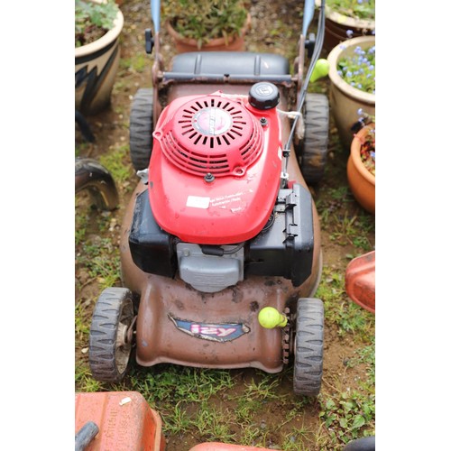 64 - Honda lawnmower, runs but pull cord broken