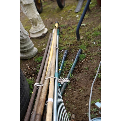 69 - 2 bundles of assorted garden tools & loppers