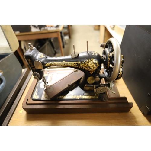 124 - Old Singer sewing machine in case