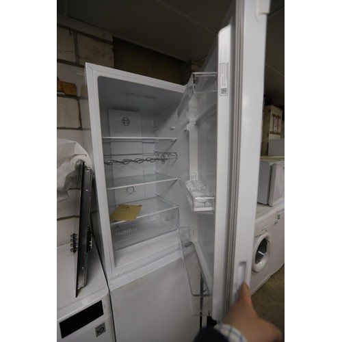 133 - Bosch fridge freezer with manual - warranted until 12 noon Tuesday following the above sale