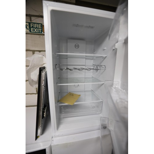 133 - Bosch fridge freezer with manual - warranted until 12 noon Tuesday following the above sale