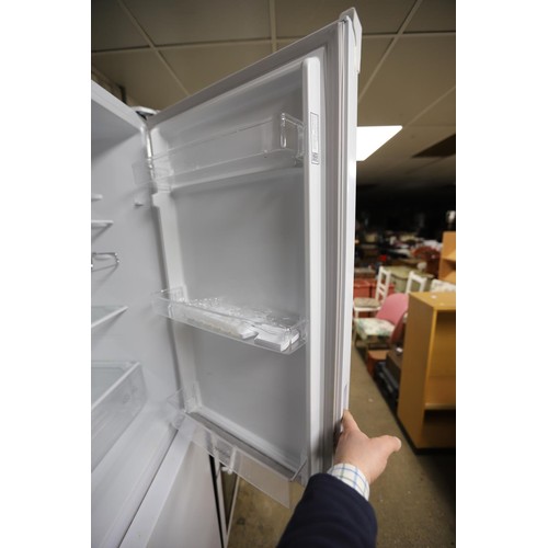 133 - Bosch fridge freezer with manual - warranted until 12 noon Tuesday following the above sale