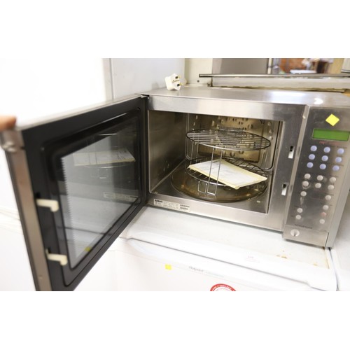 140 - Sanyo microwave - warranted until 12 noon Tuesday following the above sale