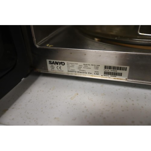 140 - Sanyo microwave - warranted until 12 noon Tuesday following the above sale