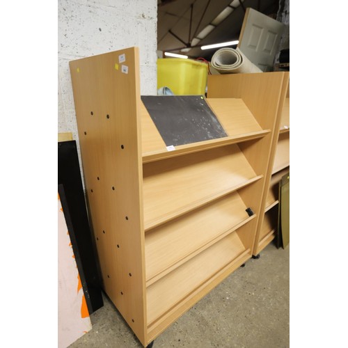 147 - Double sided bookshelf on wheels