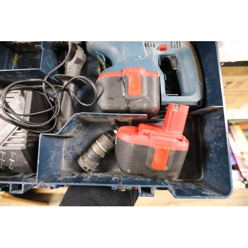 244 - Large cased Bosch 24v dual chuch SDS drill