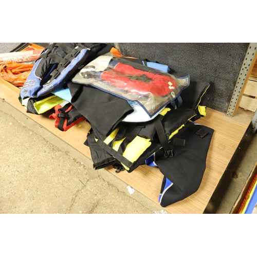 331 - 7 x life jackets/2 x wet suits/body board