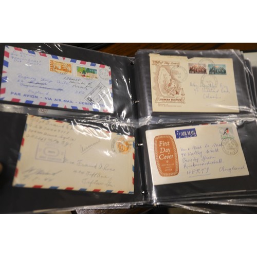 409 - 2 albums of first day covers & commercial envelopes