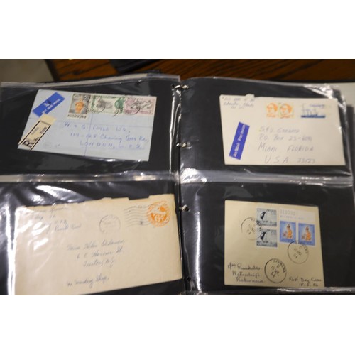 409 - 2 albums of first day covers & commercial envelopes