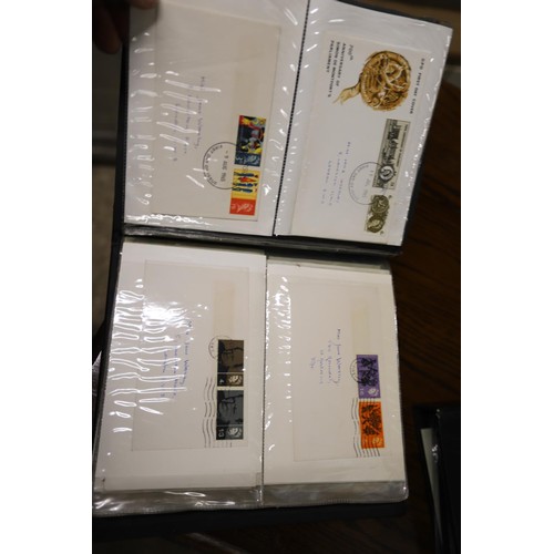 409 - 2 albums of first day covers & commercial envelopes