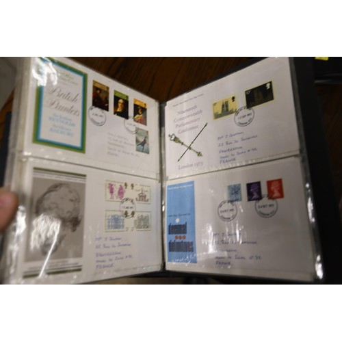 409 - 2 albums of first day covers & commercial envelopes